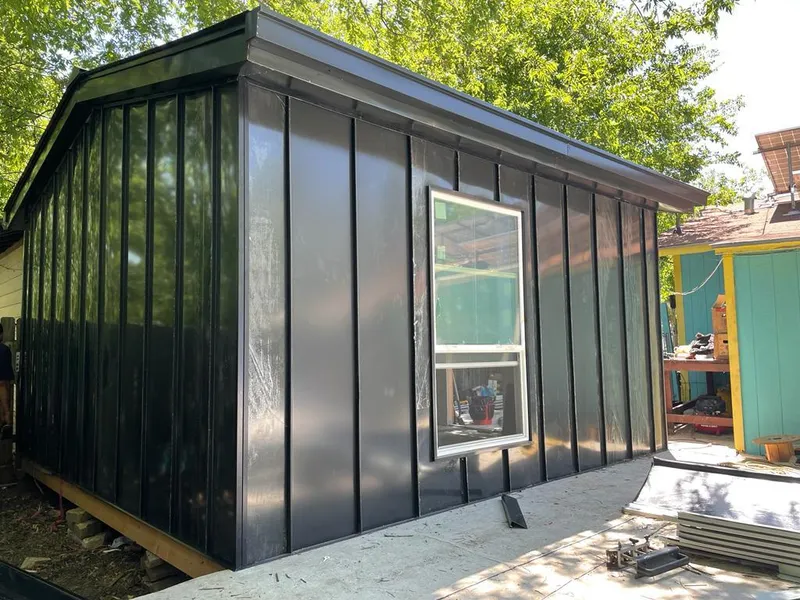 Black standing seam metal wall panels for Roof Inspection in South Strabane